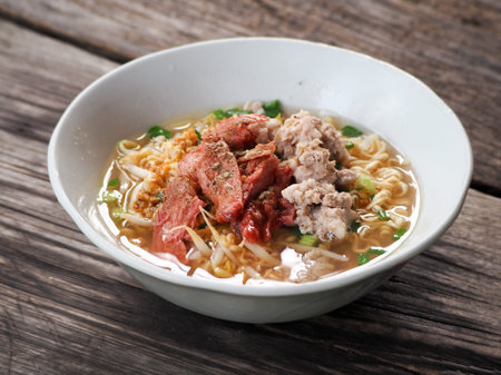 Closeup of hot noodles. Thai local noodle. Thai style pork spicy noodle soup. Pork noodle spicy soup...