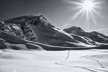 Winter mountain landscape sunlit. Sunshine. Black and white. Davos, canton Graubenden, Swiss Alpsの写真素材