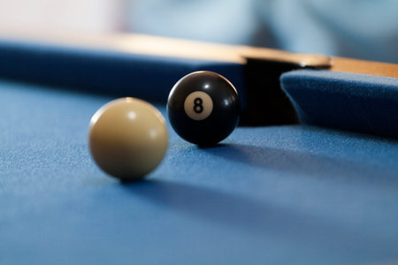 Focus on black billiard ball