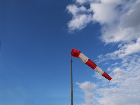 wind cone wind cone on a background of clouds half of the skyの写真素材