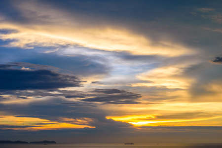 Fishing boat in the sea at golden time.の写真素材