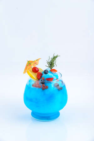 Blue burry and strawberry blue hawaii smoothie. Beverage for summer with whitebackground.の写真素材