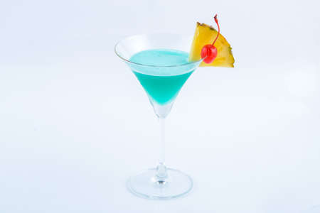 Blue hawaii with pineappale. Beverage for summer with white background.の写真素材