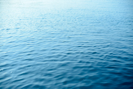 Sea and wave with blue sky at sunset.