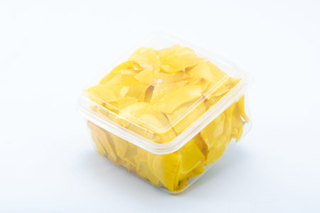Favorite snack in Thailand. Dried durian in the transparent box.の写真素材