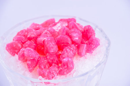 Thai dessert. Water chestnuts with syrup in the glass.の写真素材