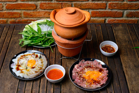 Korean food beefsteak with egg and vegetable in clay potの写真素材
