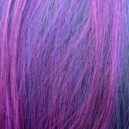background from blue and pink colored hairs close upの写真素材