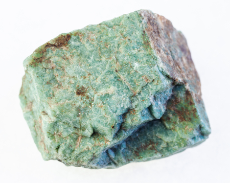 macro photography of natural mineral from geological collection - raw amazonite stone on white backgroundの写真素材