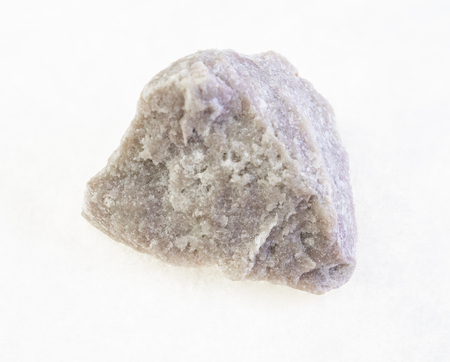 macro photography of natural mineral from geological collection - rough dolomite stone on white backgroundの写真素材