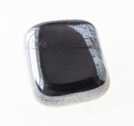 macro photography of natural mineral from geological collection - polished hematite (haematite) gem...