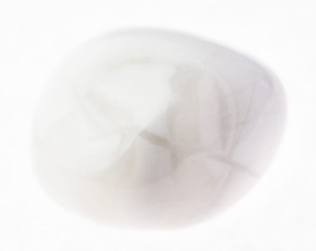 macro photography of natural mineral from geological collection - polished magnesite gemstone on...