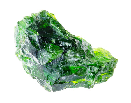 macro photography of natural mineral from geological collection - rough chrome diopside (siberian emerald) crystal on white backgroundの写真素材