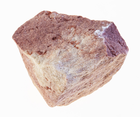 macro photography of natural mineral from geological collection - raw calcareous sandstone stone on white backgroundの写真素材