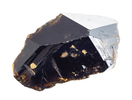 macro photography of natural mineral from geological collection - raw cassiterite (ore of tin) stone on white backgroundの写真素材