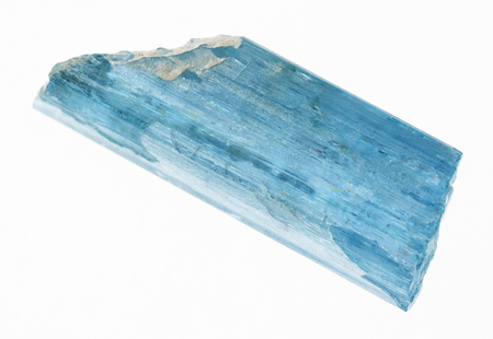 macro photography of natural mineral from geological collection - rough aquamarine (blue beryl) crystal on white backgroundの写真素材