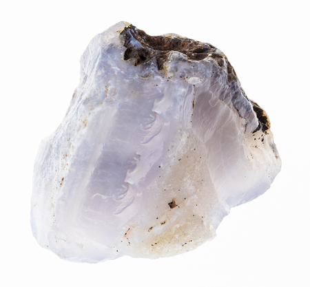 macro photography of natural mineral from geological collection - raw blue Chalcedony stone on white backgroundの写真素材