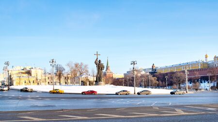 MOSCOW, RUSSIA - JANUARY 25, 2019: panoramic view of Borovitskaya Square with cars and Monument to Vladimir the Great near Kremlin in Moscow city in sunny winter dayのeditorial素材