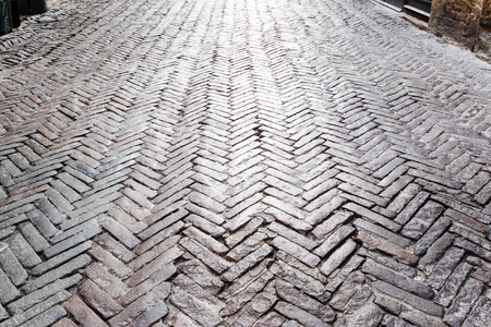 Travel to Italy - stone pavement of street via Bartolomeo Colleoni in Citta Alta (Upper Town) of Bergamo city, Lombardyの写真素材