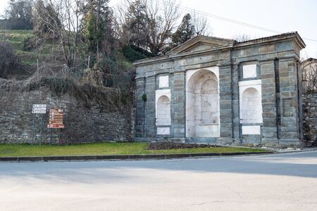 BERGAMO, ITALY - FEBRUARY 19, 2019: medieval fountain Fontana di Sant'Agostino near Porta San Agostino in Bergamo city. It was built in 1575のeditorial素材