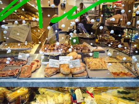 BERGAMO, ITALY - FEBRUARY 23, 2019: window of bakery and pastry shop with traditional local products in Citta Alta (Upper Town) of Bergamo city, Lombardyのeditorial素材