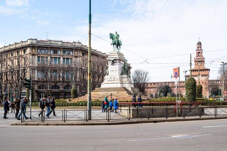 MILAN, ITALY - FEBRUARY 24, 2019: tourists on square Largo Cairoli near Monument to Giuseppe Garibaldi in Milan city. The statue was created in 1895 by Ettore Ximenes and Augusto Guidiniのeditorial素材