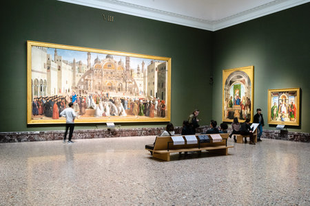 MILAN, ITALY - FEBRUARY 24, 2019: visitors indoor of Pinacoteca di Brera (Brera Art Gallery) in...