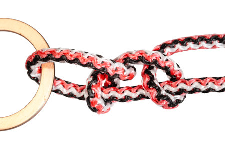 hammock hitch knot close up tied on synthetic rope cut out on white background