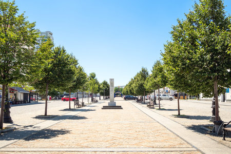 NOVOROSSIYSK, RUSSIA - JULY 7, 2019: view of pedestrian part of street of the Novorossiysk Republic with obelisk. Novorossiysk is city in Krasnodar Krai, Russia, it is main country's port on Black Seaのeditorial素材