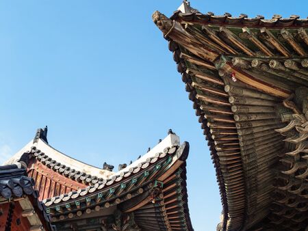 SEOUL, SOUTH KOREA - OCTOBER 31, 2019: bottom view of roofs in Changgyeong Palace in Seoul city. The palace was built in the mid-15th century and it was renovated and enlarged in 1483のeditorial素材