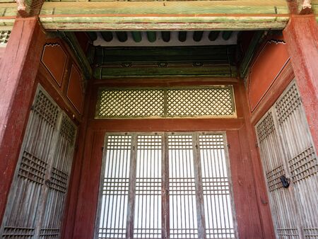 SEOUL, SOUTH KOREA - OCTOBER 31, 2019: wooden doors in Changgyeong Palace in Seoul city. The palace was built in the mid-15th century and it was renovated and enlarged in 1483のeditorial素材