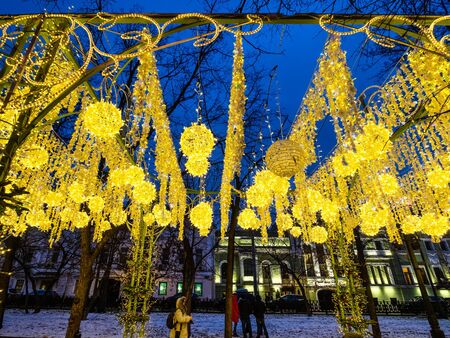 MOSCOW, RUSSIA - JANUARY 2, 2020: yellow illumination on Tverskoy Boulevard during Christmas holidays in Moscow in evening. Tverskoy Boulevard is one of the main thoroughfares in central Moscowのeditorial素材