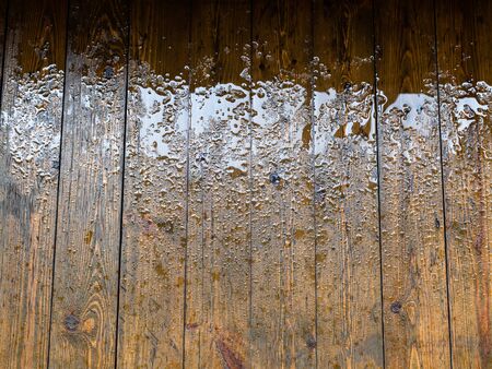 indoor wet wooden floor from varnished spruce floorboard after rainの写真素材