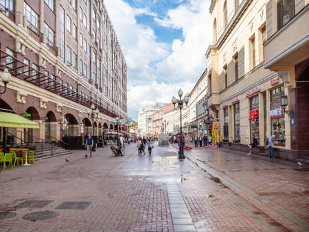 MOSCOW, RUSSIA - JULY 19, 2020: view of old Arbat Street with people from Arbat Square in Moscow city in Sunday morning. The Arbat is pedestrian street about one km long in historical center of Moscowのeditorial素材