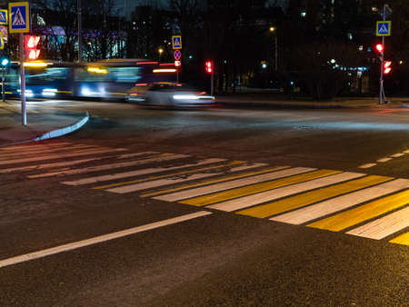 view of street pedestrian crossing in Moscow city in autumn nightの写真素材