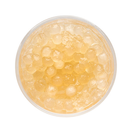 top view of boiled tapioca balls in glass bowl cutout on white background