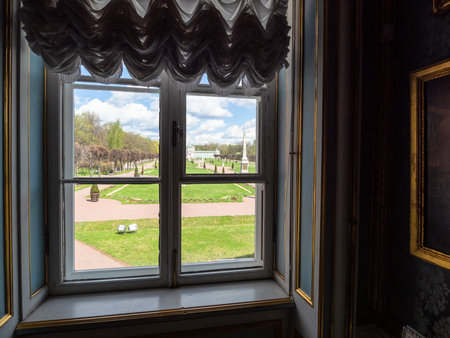 Moscow, Russia - May 7, 2021: view of garden through window in The Palace in Kuskovo estate. Kuskovo was the summer country house and estate of the Sheremetev family, it was built in the 18th centuryのeditorial素材