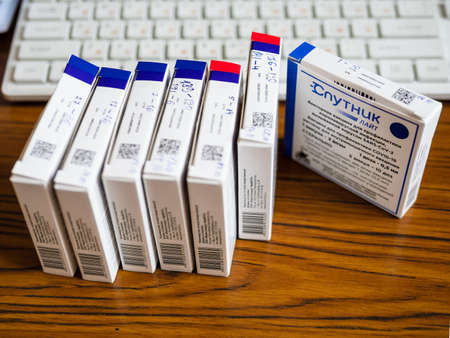 Moscow, Russia - October 17, 2021: boxes with the Russian vaccine against coronavirus infection Sputnik Light closeup on table in clinicのeditorial素材