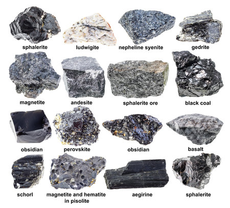 set of various unpolished black minerals with names cutout on white background