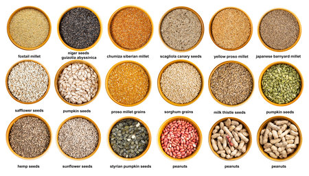 set of various grains, seeds and nuts in bowls with names cutout on white background