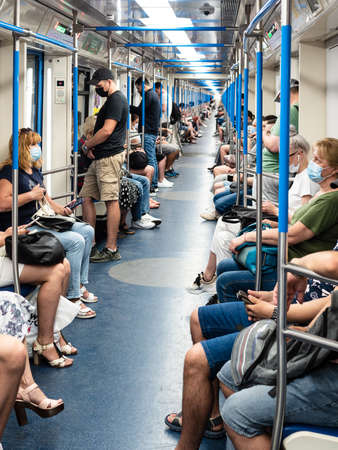 Moscow, Russia - July 11, 2021: passengers in new carriage of Moscow Metro in summer season. Moscow Metro has 241 stations (276 with Moscow Central Circle) and its route length is 412.1 kmのeditorial素材