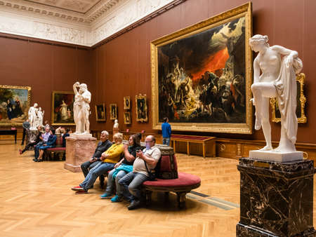 Saint Petersburg, Russia - May 14, 2022: people in big hall of State Russian Museum in St Petersburg. In 2021 Russian Museum was ranking second on list of most-visited art museums in the worldのeditorial素材