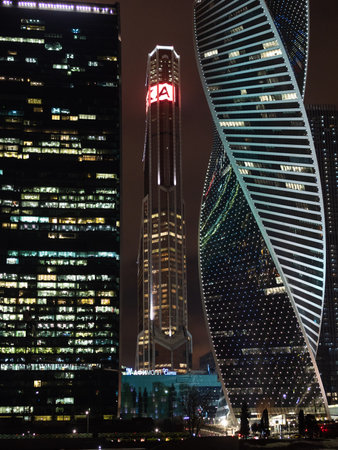 Moscow, Russia - February 7, 2023: view of modern glass towers in Moscow city business district in the evening from from Taras Shevchenko embankment of Moskva riverのeditorial素材