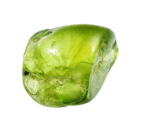 specimen of natural tumbled peridot crystal cutout on white background