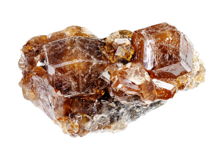 specimen of natural raw hessonite gross crystals cutout on white background