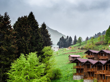 gray clouds over summer houses and mountain in Hamsikoy village, Turkeyの写真素材