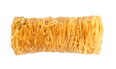 piece of sweet baklava roll cut out on white backgroundの写真素材