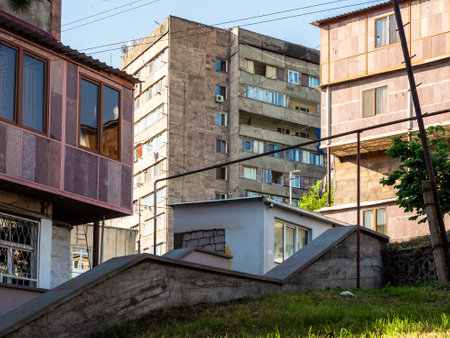 urban houses in Kapan town, in Syunik Province of Armenia in sunny spring morningの写真素材
