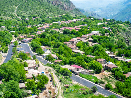 above view of Halidzor village in mountain valley from Wings of Tatev funicular on sunny May day in...