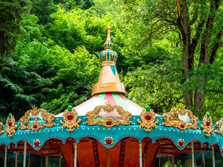 colorful carousel tent in Central park in Borjomi resort town, Georgia on sunny summer dayの写真素材